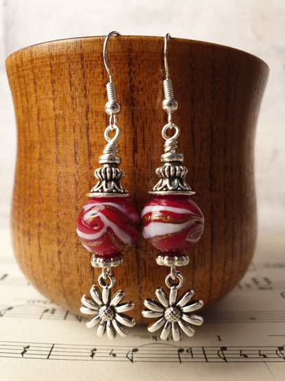 Glass bead and flower design dangle earrings