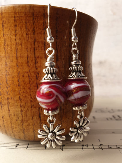 Glass bead and flower design dangle earrings