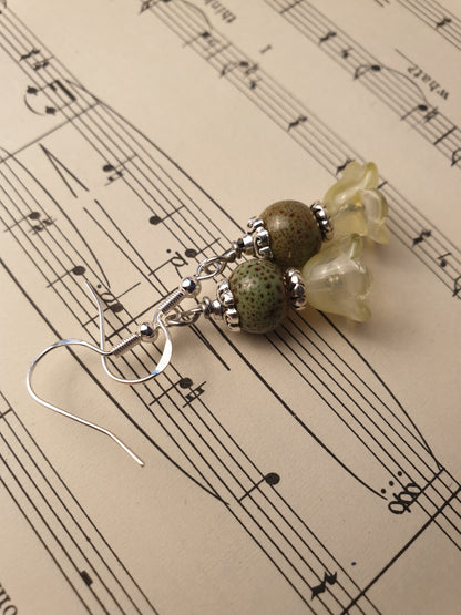 Ceramic bead and glass flower dangle earrings