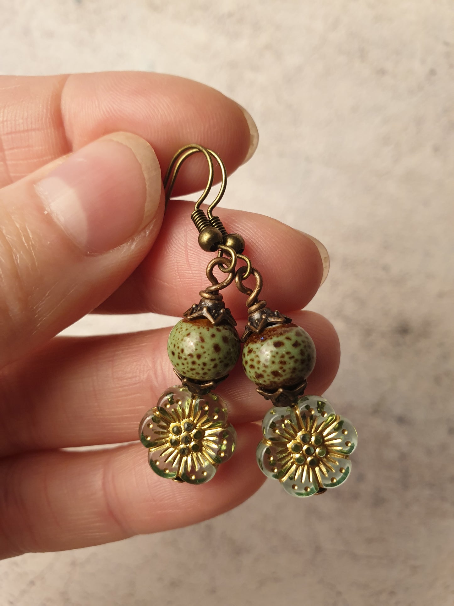 Ceramic bead and flower design dangle earrings