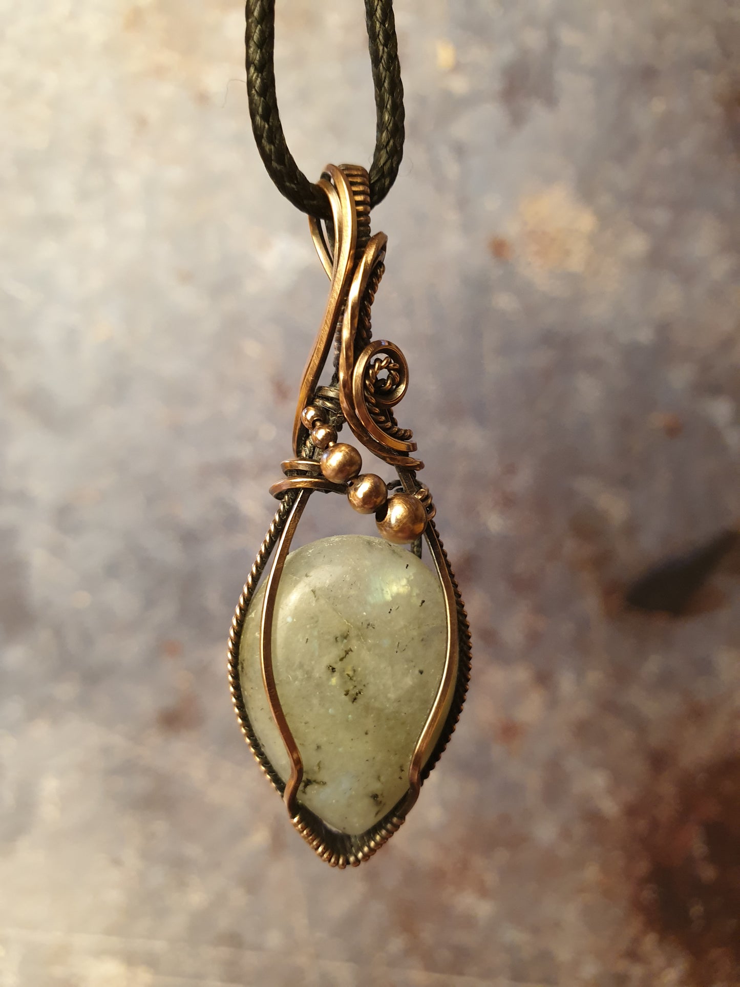 Wire wrapped rainbow moonstone pendant