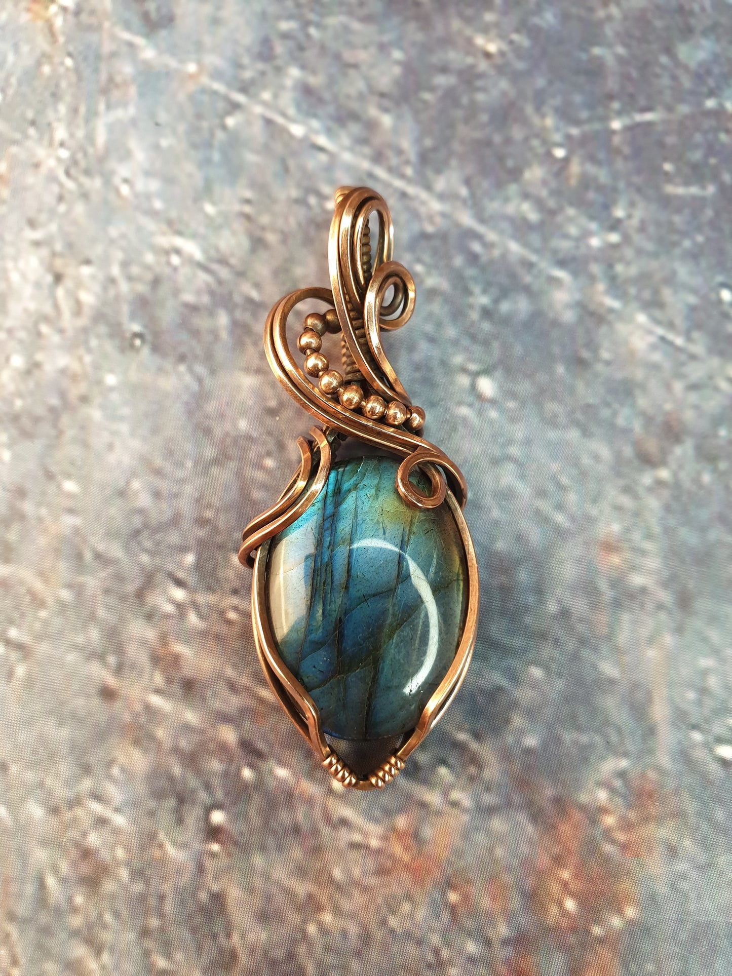 Antique-style blue labradorite gemstone pendant wire wrapped in antiqued copper