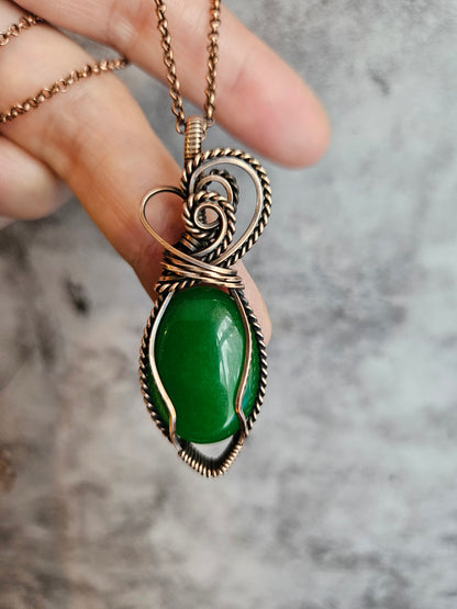 Green jade wire wrapped pendant