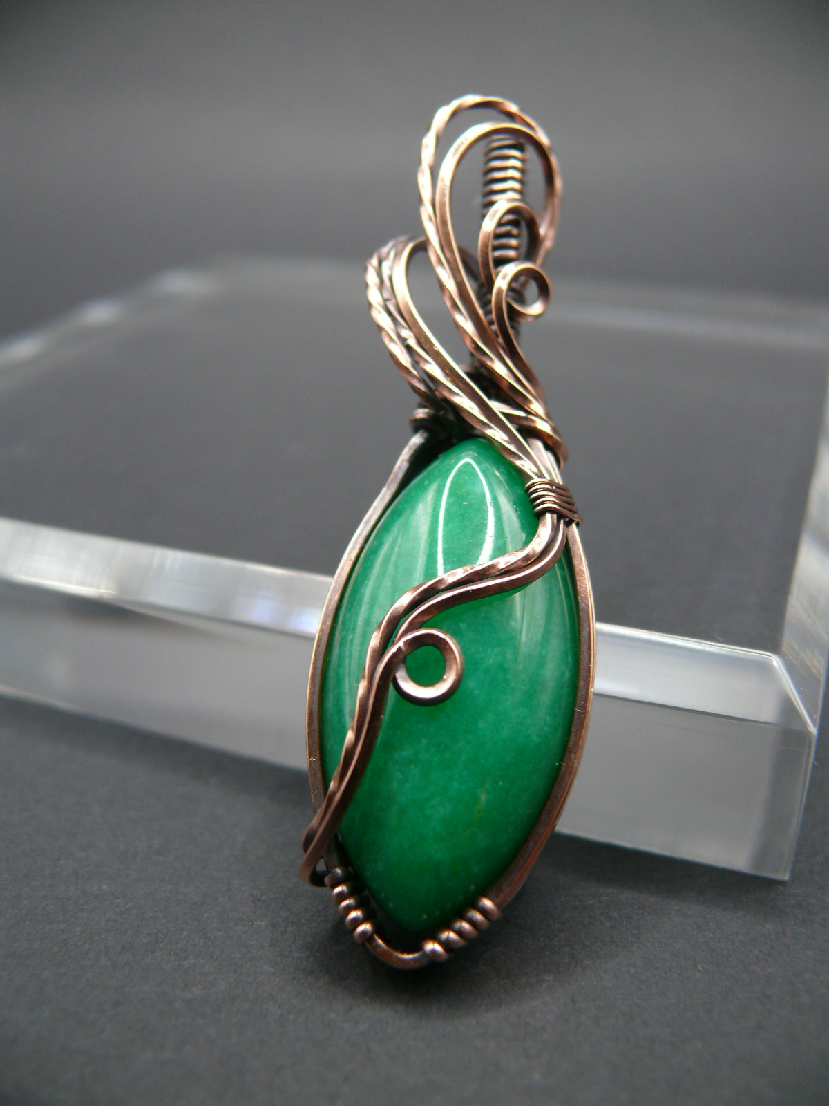 Green jade wire wrapped pendant