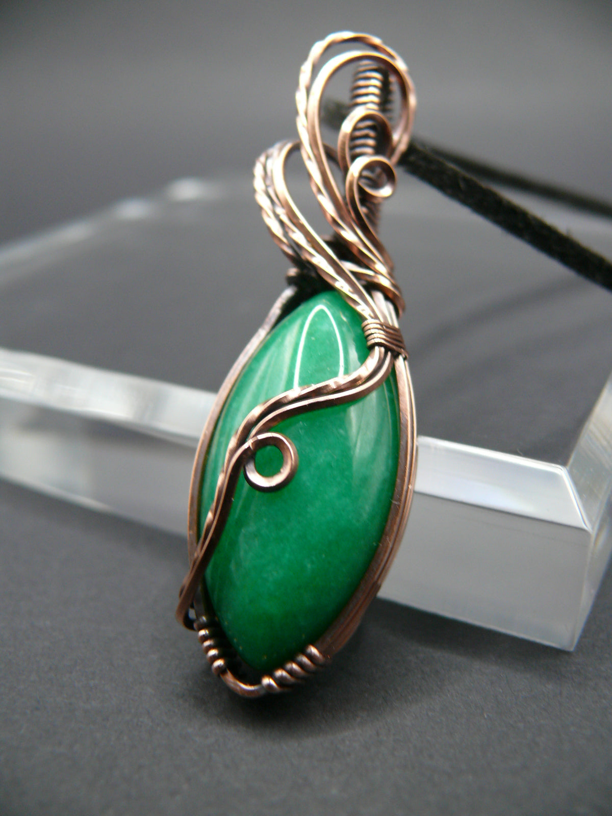 Green jade wire wrapped pendant