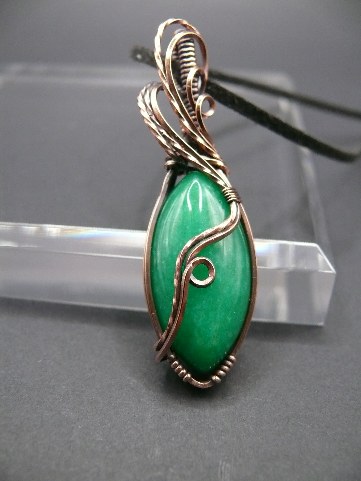 Green jade wire wrapped pendant