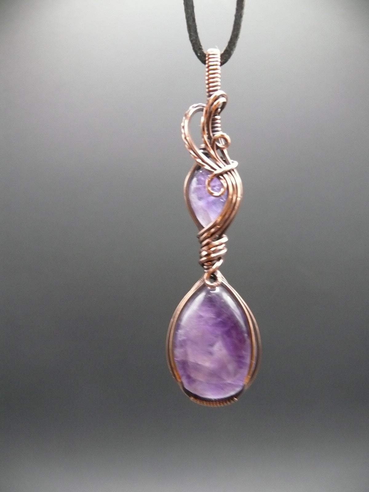 Double amethyst gemstone pendant