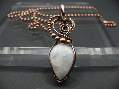 White moonstone gemstone pendant in antiqued copper