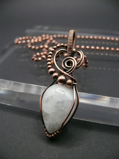 White moonstone gemstone pendant in antiqued copper