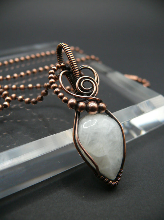 White moonstone gemstone pendant in antiqued copper