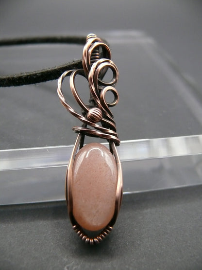 Wire wrapped mini peach moonstone pendant