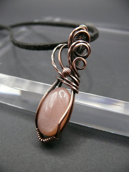 Wire wrapped mini peach moonstone pendant