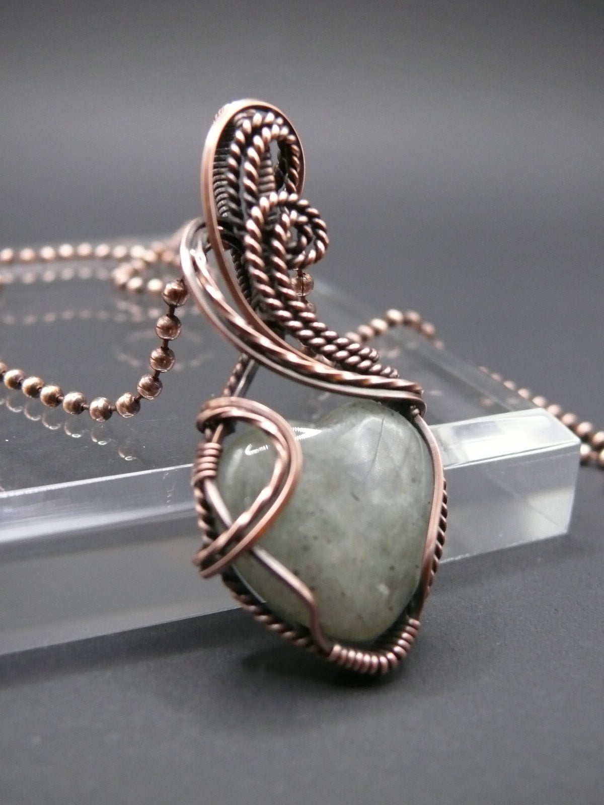 Heart shaped moonstone pendant wire wrapped in copper