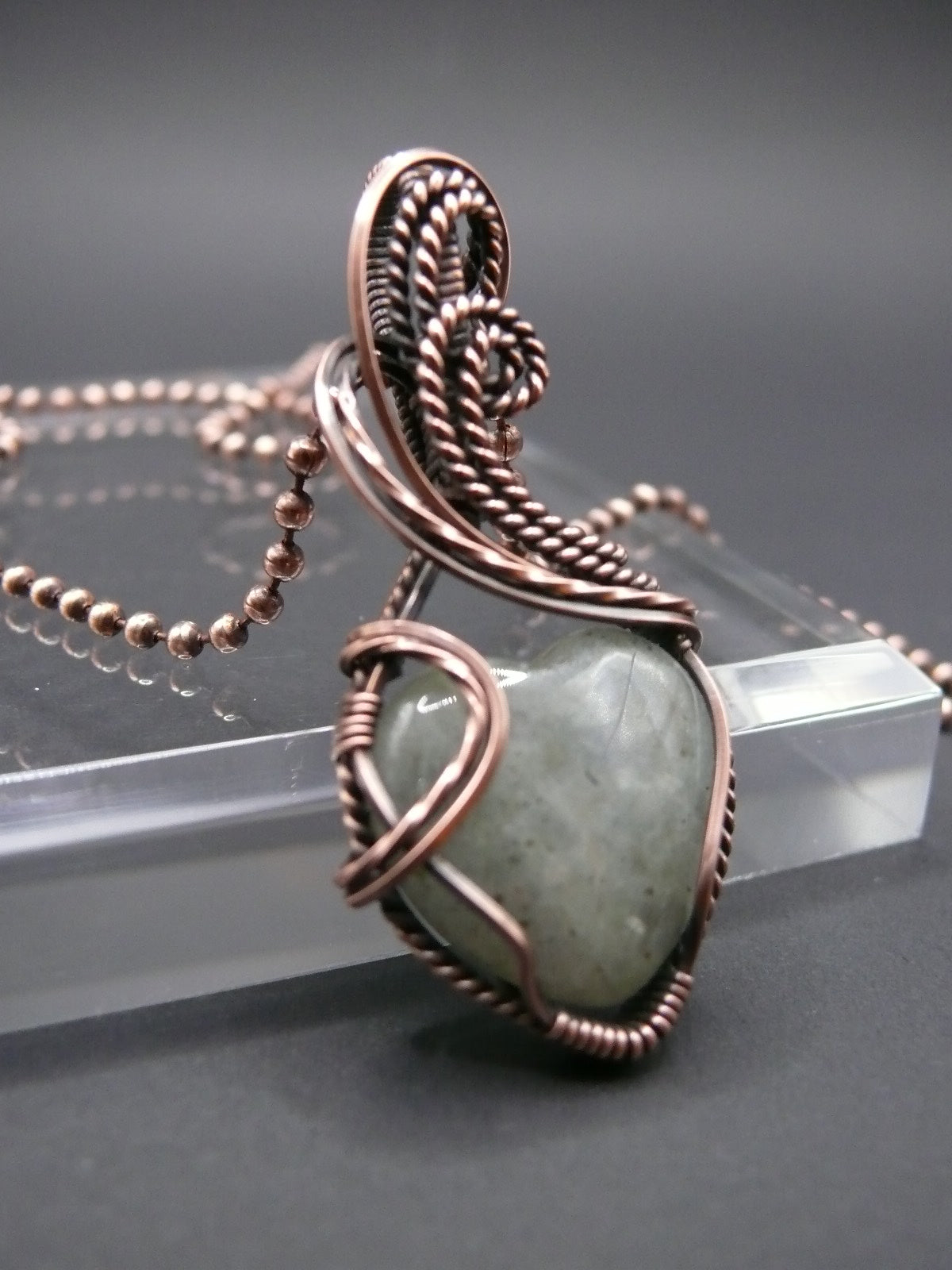 Heart shaped moonstone pendant wire wrapped in copper