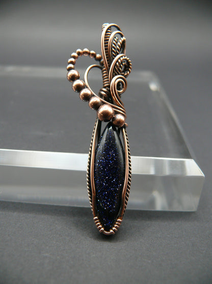 Blue sandstone pendant wire wrapped in copper