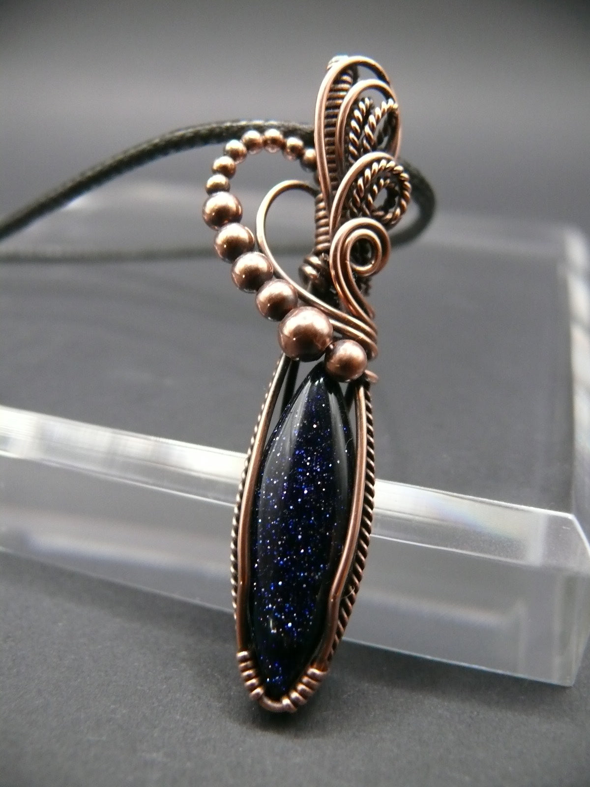 Blue sandstone pendant wire wrapped in copper