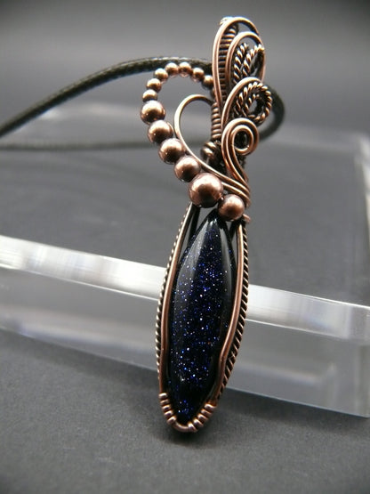 Blue sandstone pendant wire wrapped in copper