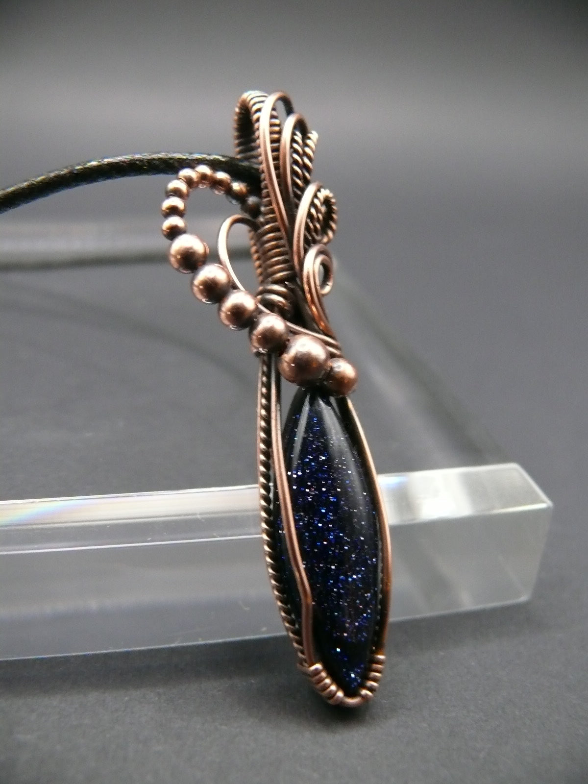 Blue sandstone pendant wire wrapped in copper