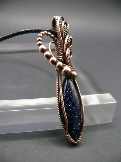 Blue sandstone pendant wire wrapped in copper