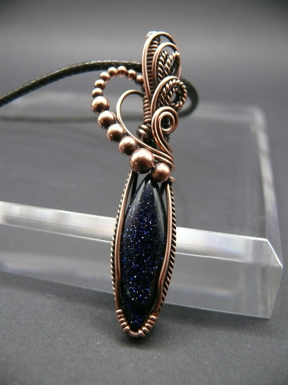 Blue sandstone pendant wire wrapped in copper