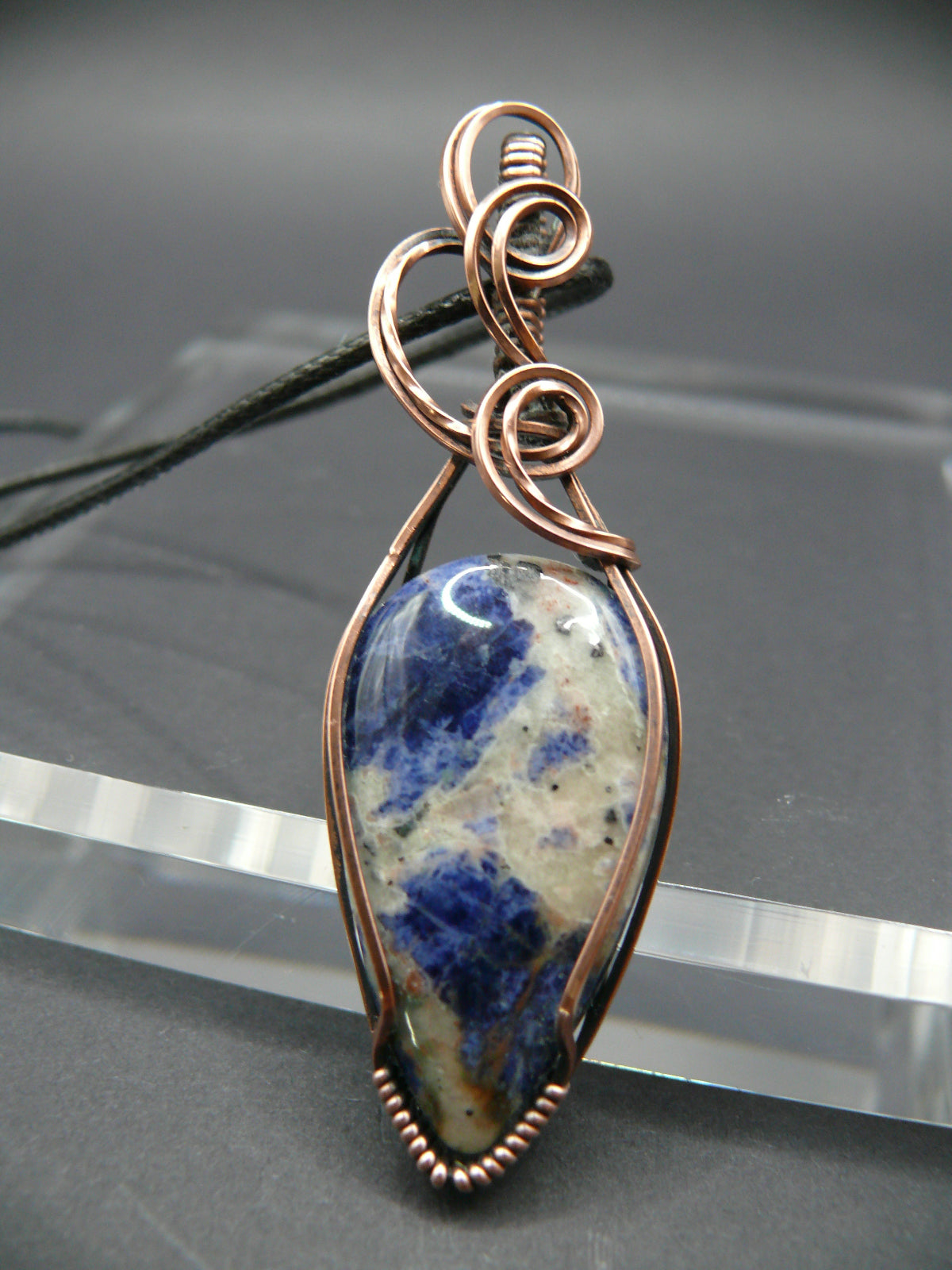 Wire wrapped blue sodalite pendant