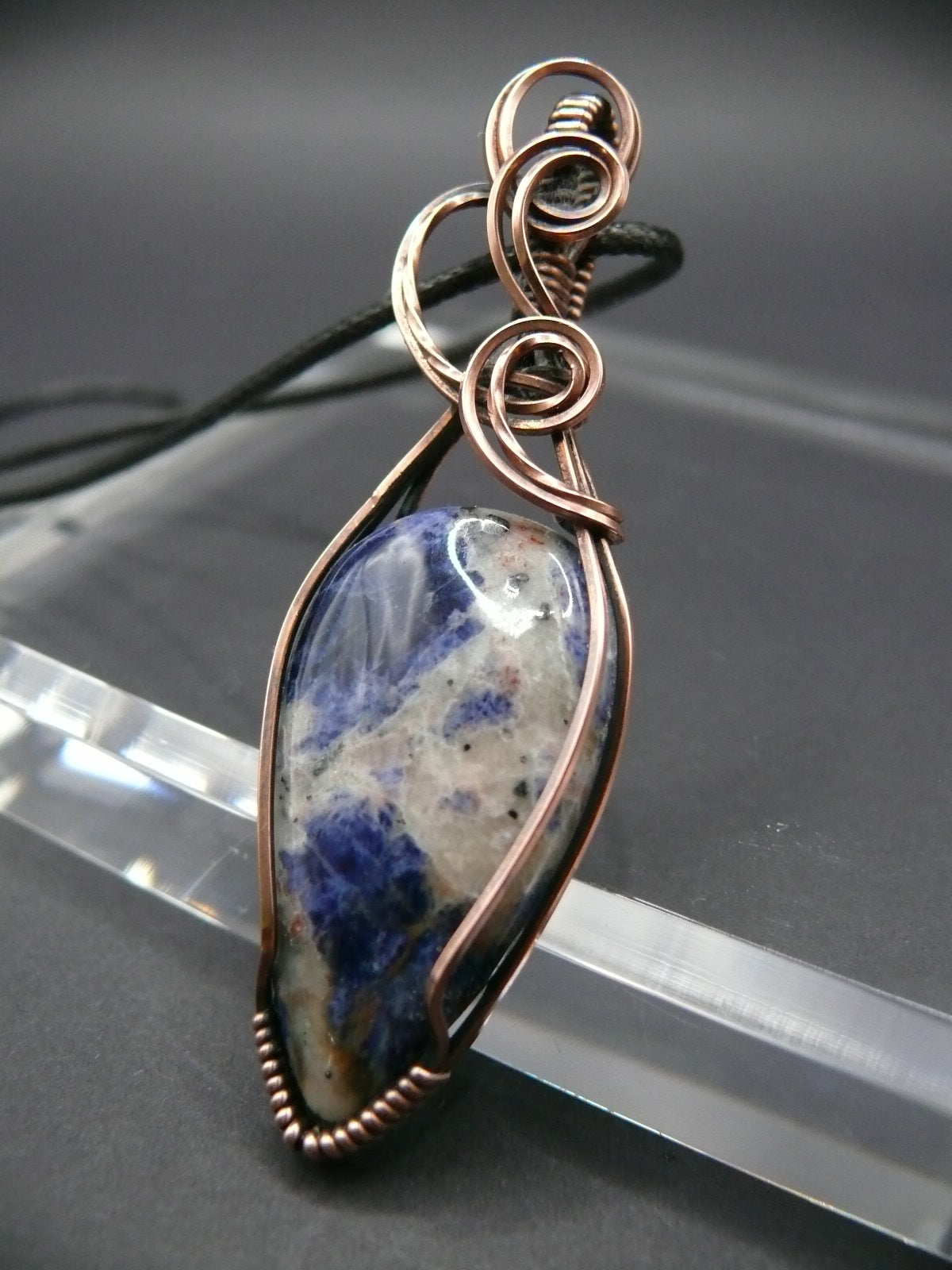 Wire wrapped blue sodalite pendant