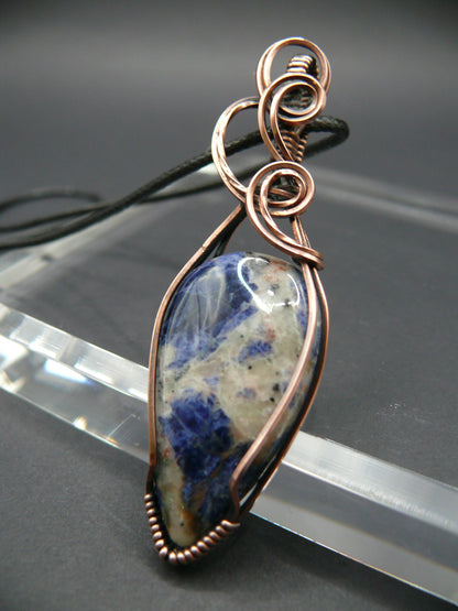 Wire wrapped blue sodalite pendant