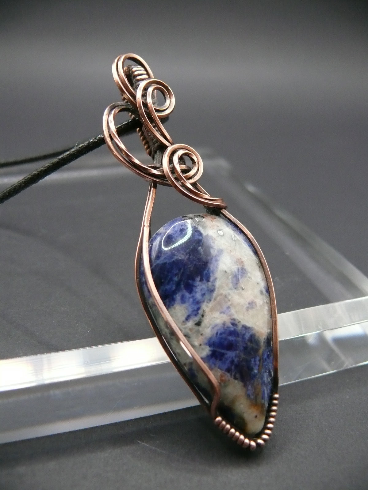 Wire wrapped blue sodalite pendant