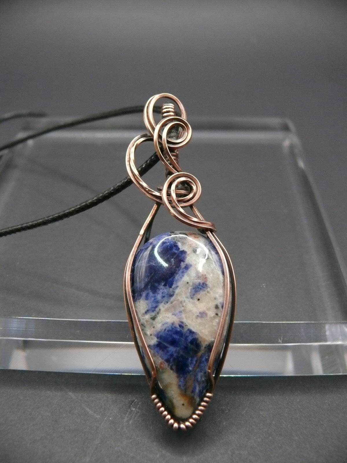 Wire wrapped blue sodalite pendant