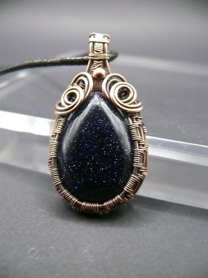 Antiqued wire wrapped blue sandstone pendant