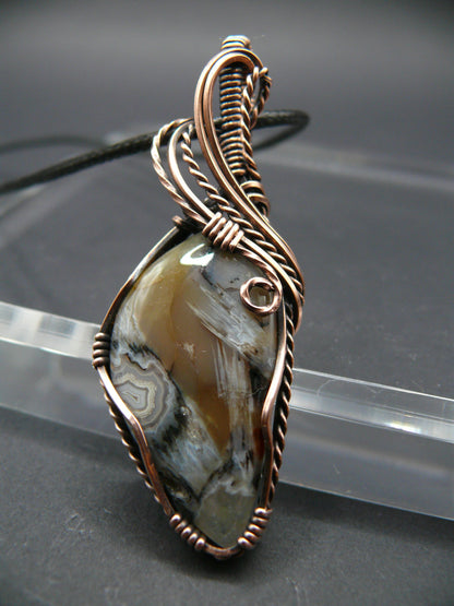 Ocean jasper gemstone pendant wire wrapped in copper