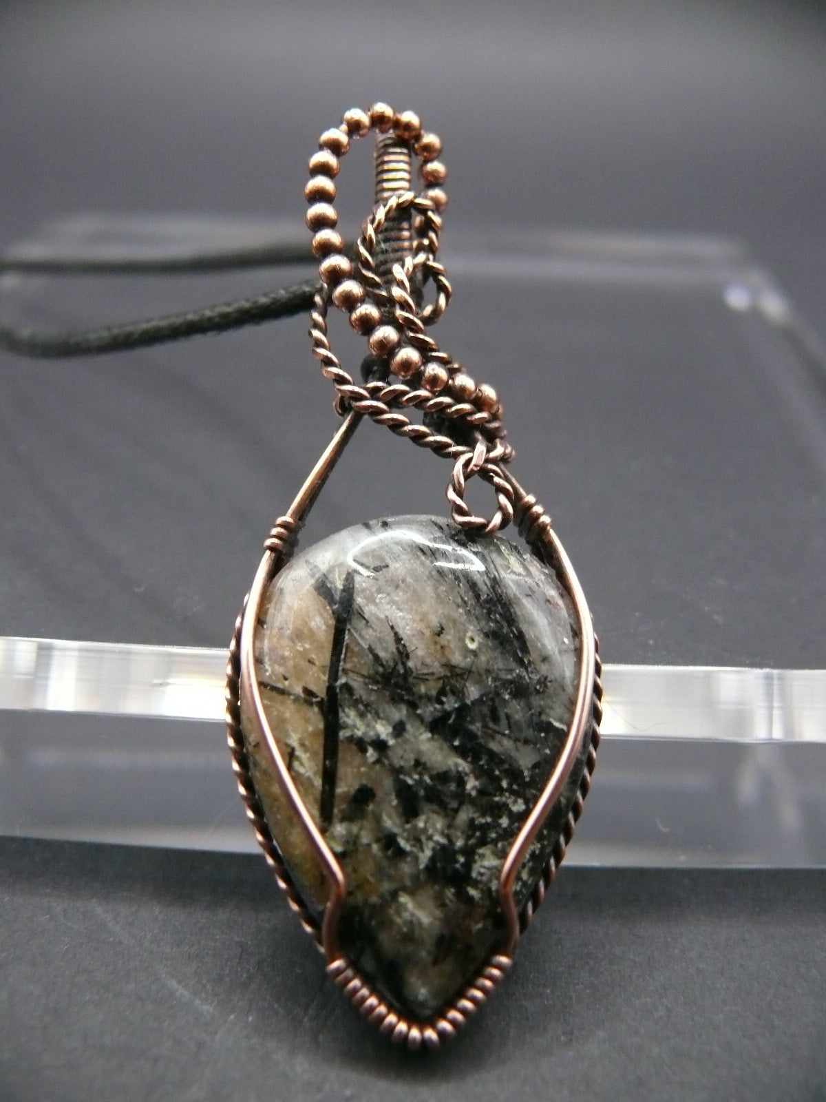 Wire wrapped rutilated jasper pendant