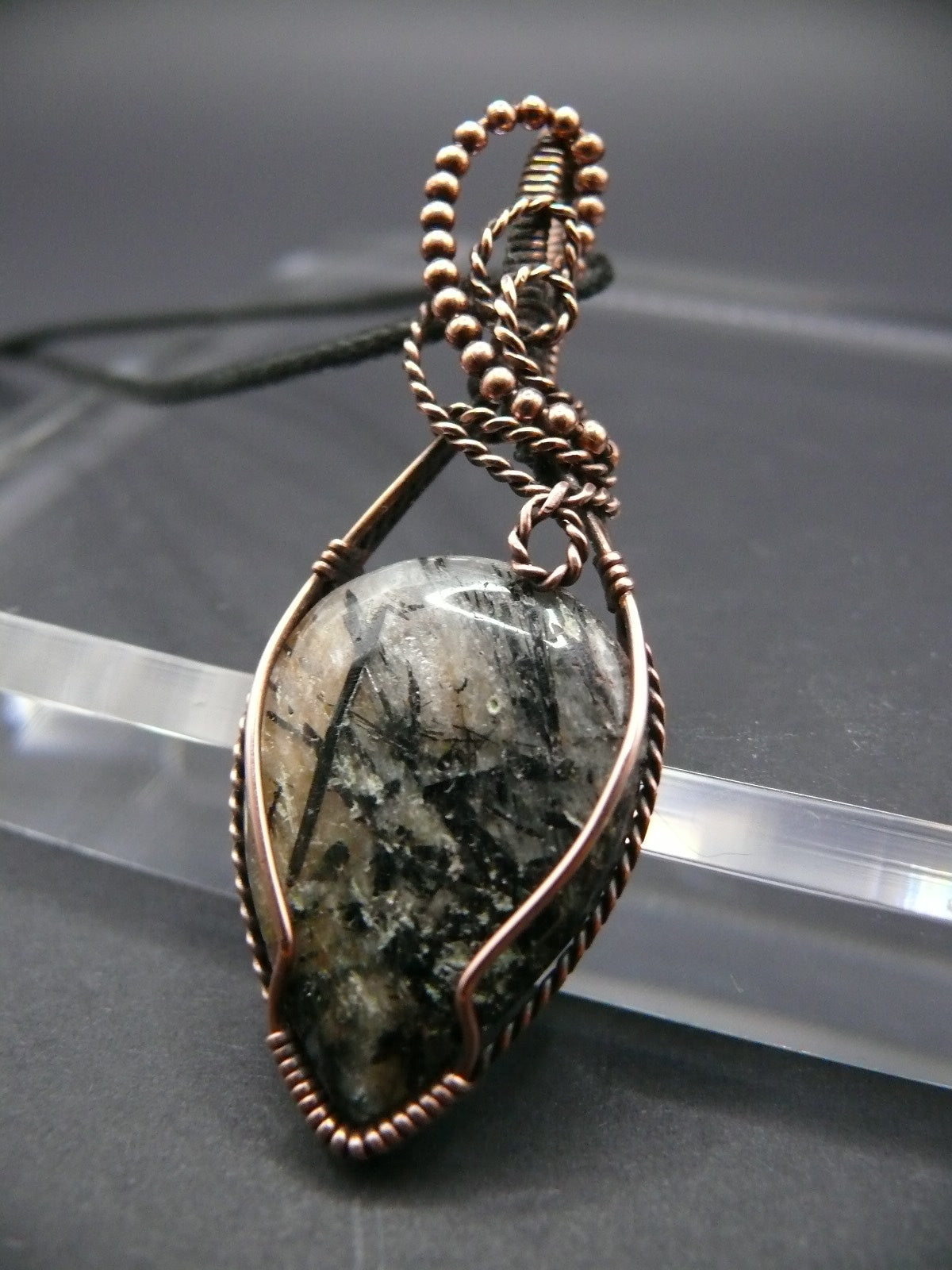 Wire wrapped rutilated jasper pendant