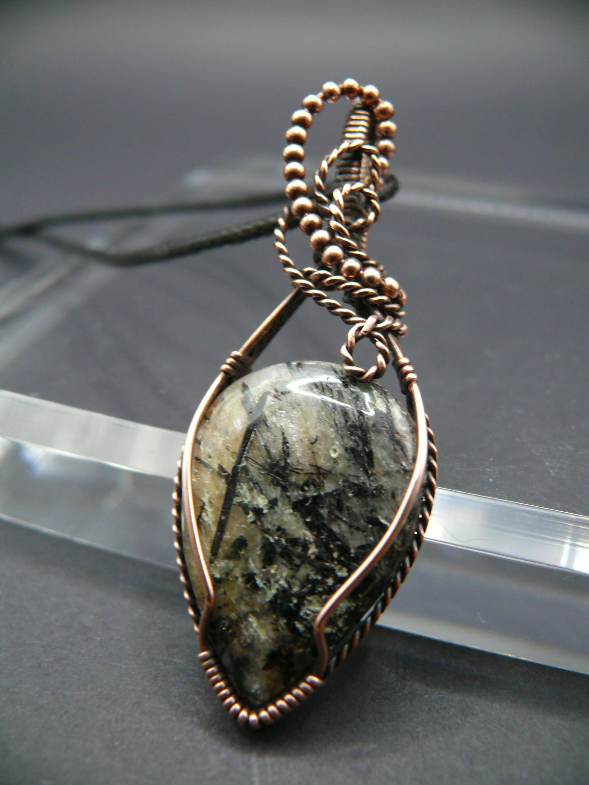 Wire wrapped rutilated jasper pendant