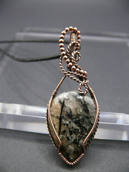 Wire wrapped rutilated jasper pendant