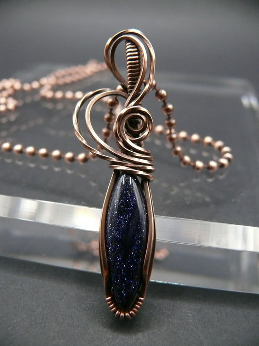 Wire wrapped blue sandstone pendant