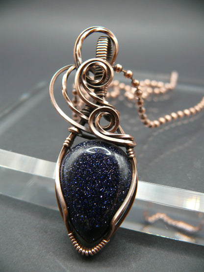 Copper wire wrapped blue sandstone pendant