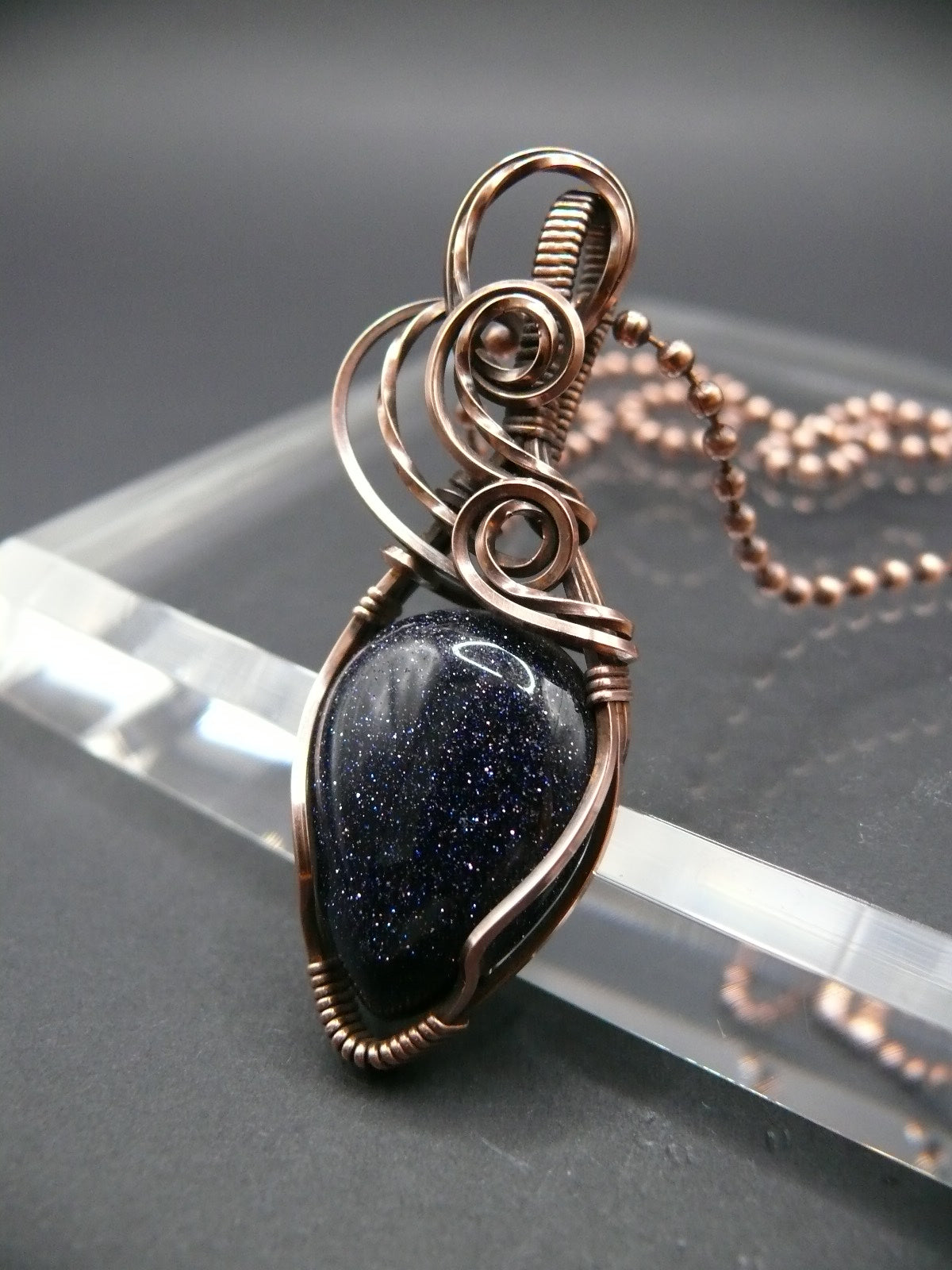 Copper wire wrapped blue sandstone pendant