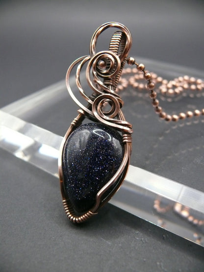 Copper wire wrapped blue sandstone pendant