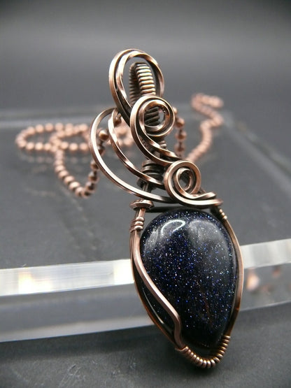 Copper wire wrapped blue sandstone pendant