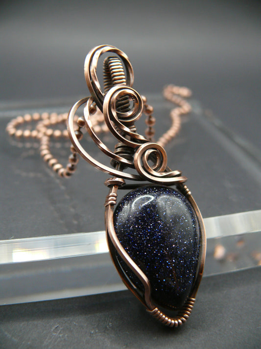 Copper wire wrapped blue sandstone pendant