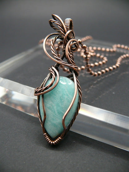 Copper wire wrapped amazonite pendant.