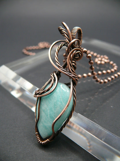 Copper wire wrapped amazonite pendant.