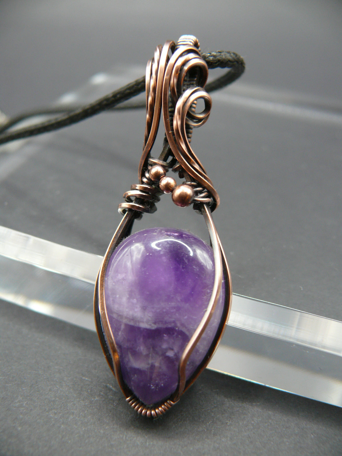 Copper wire wrapped amethyst pendant