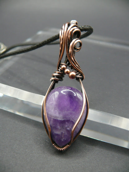 Copper wire wrapped amethyst pendant