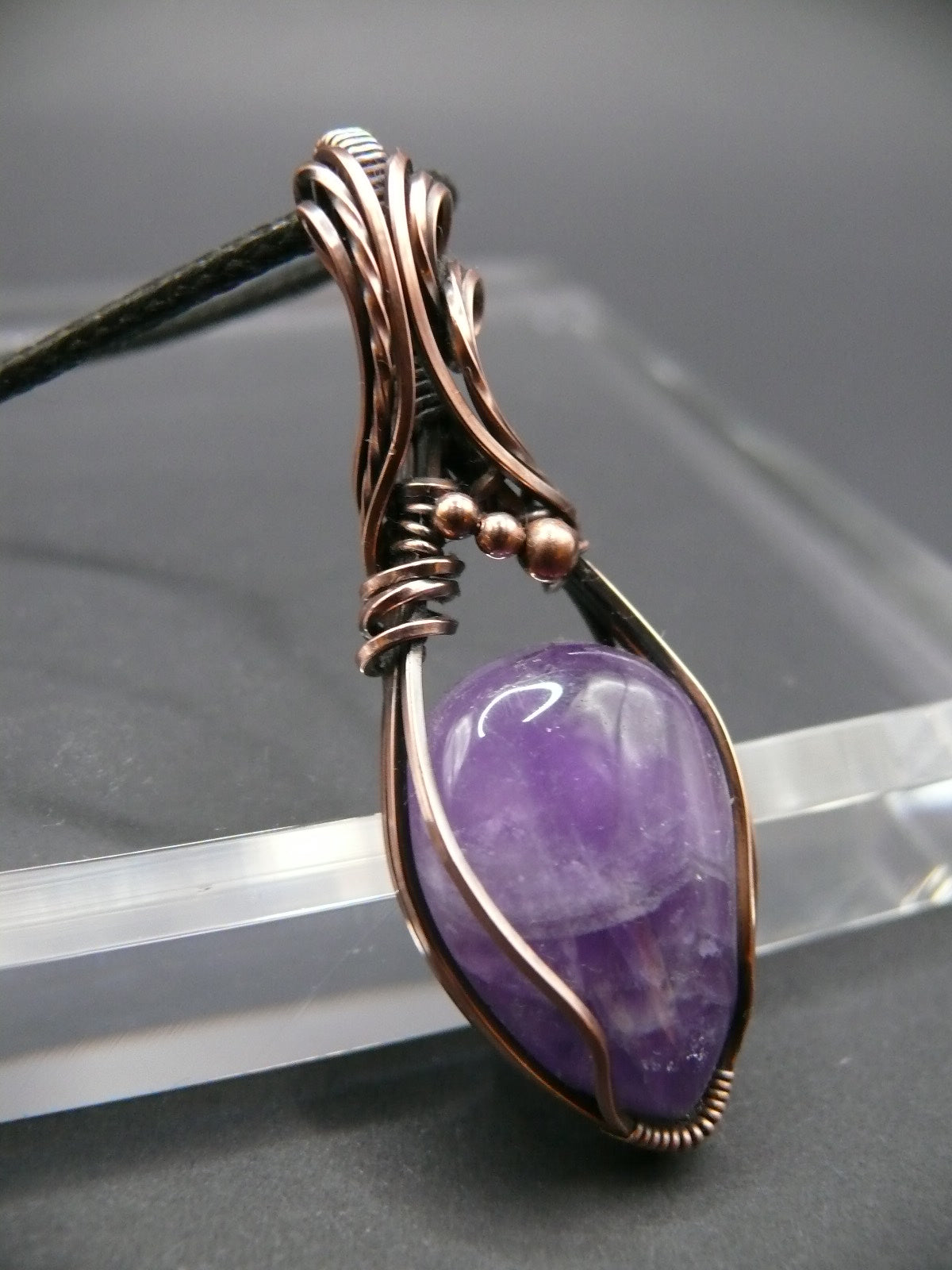 Copper wire wrapped amethyst pendant