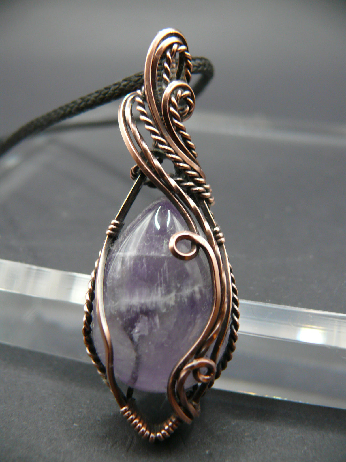 Elegant amethyst gemstone pendant in antiqued copper