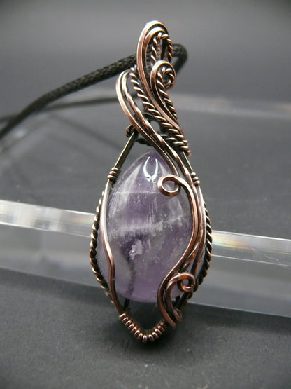 Elegant amethyst gemstone pendant in antiqued copper