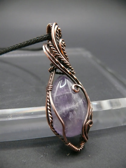 Elegant amethyst gemstone pendant in antiqued copper