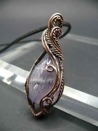 Elegant amethyst gemstone pendant in antiqued copper